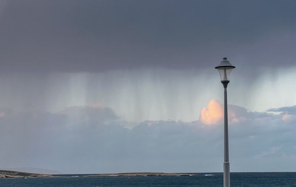 A curtain of rain moves in