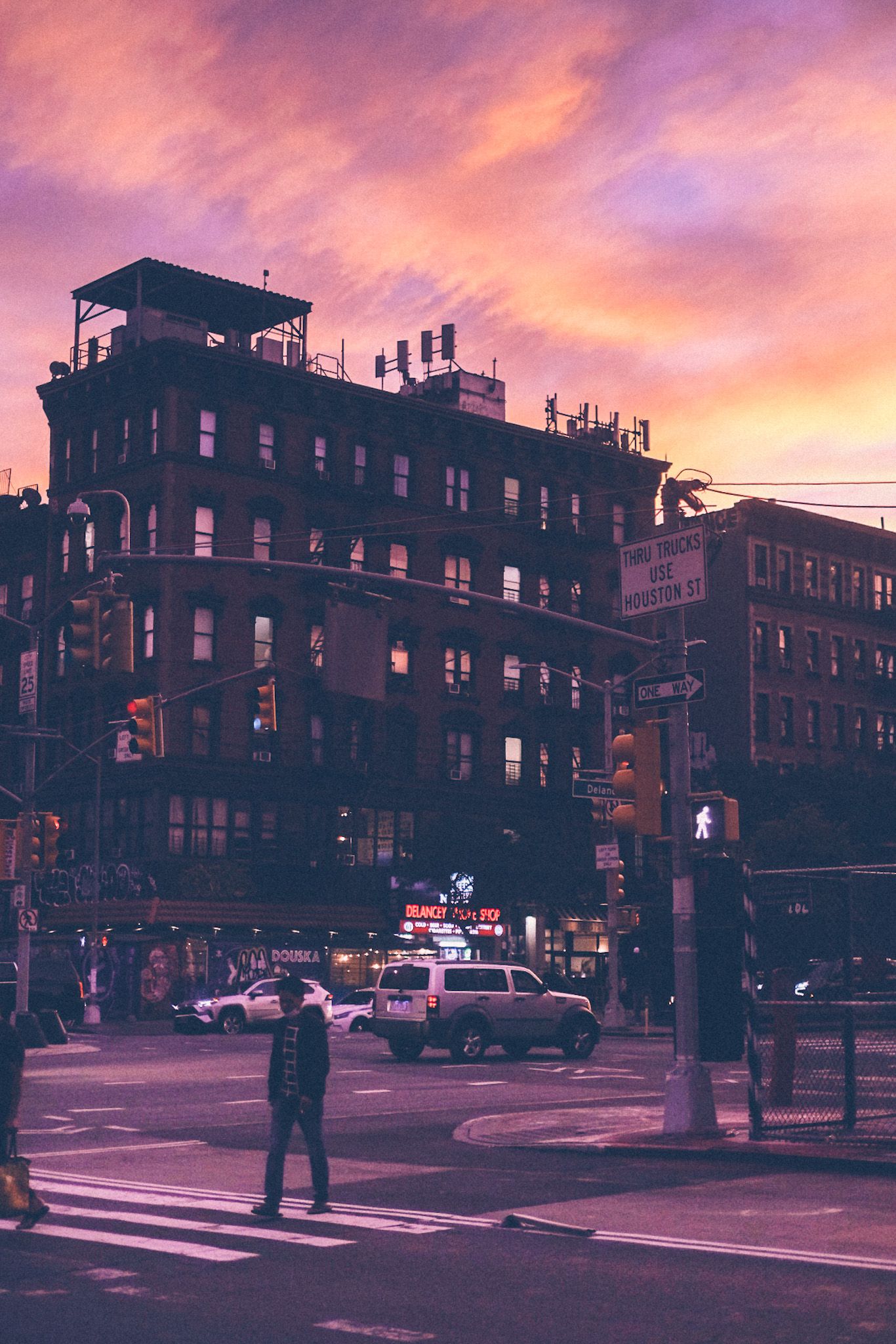 New York’s lower east side basks in the magical glow of a purple-orange sunset.
