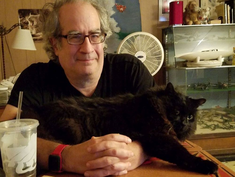 Eric Taub and Boris the cat, as posted by his sister on BalletcoForum (link below). © Eric Taub