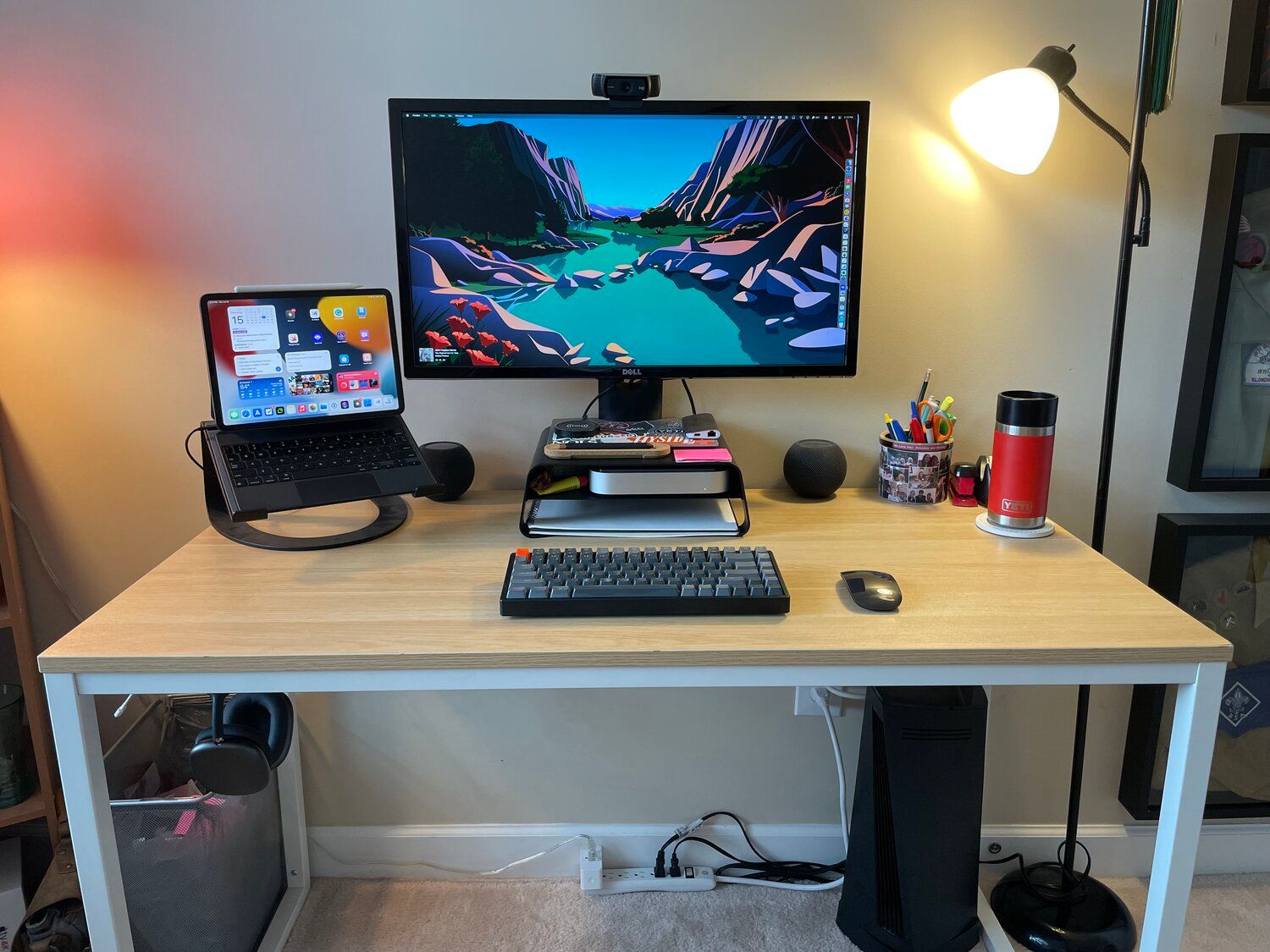 A view of my desk with computer and monitor from the front.