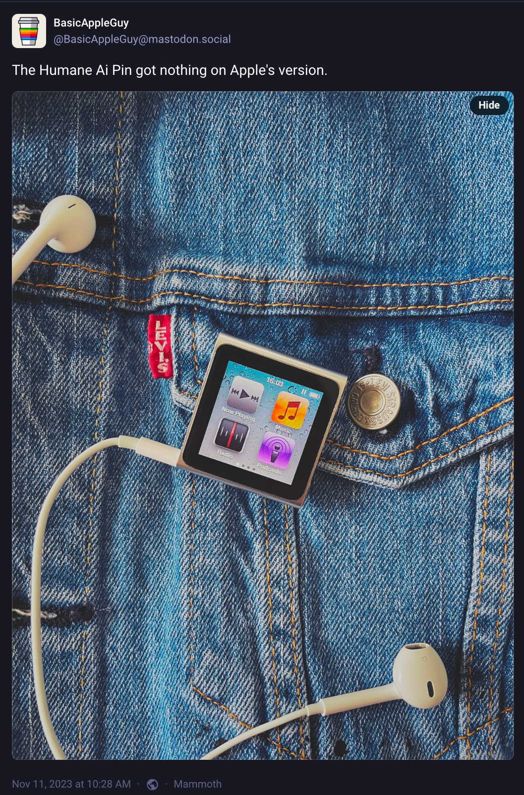 A small square music player displays icons for playing music, radio, and podcasts while clipped to blue denim jeans with a red “Levi’s” tag. A white earbud is connected. Tweet text: “The Humane AI Pin got nothing on Apple’s version.”