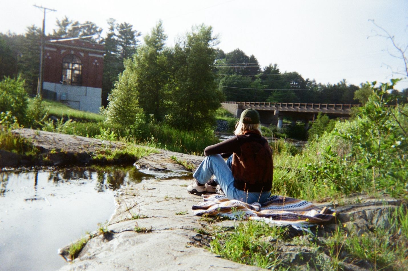 Laura serenely gazing into the distance.