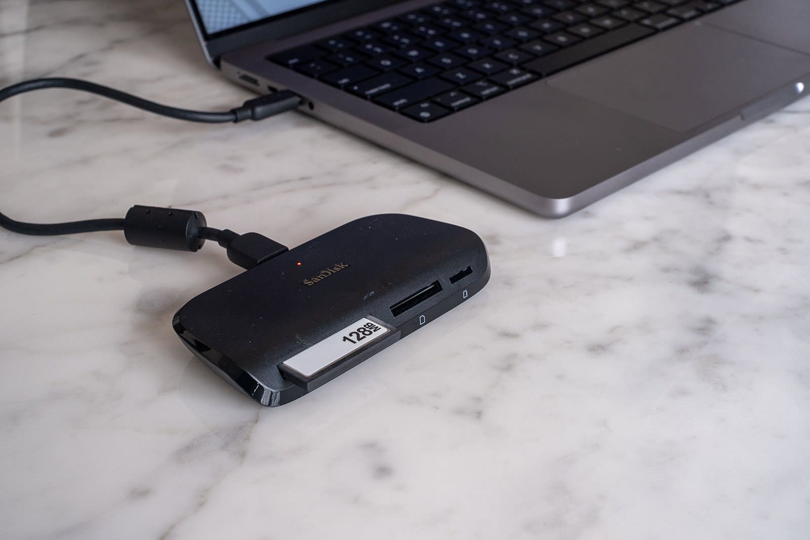 SanDisk reader connected to modern MacBook Pro
