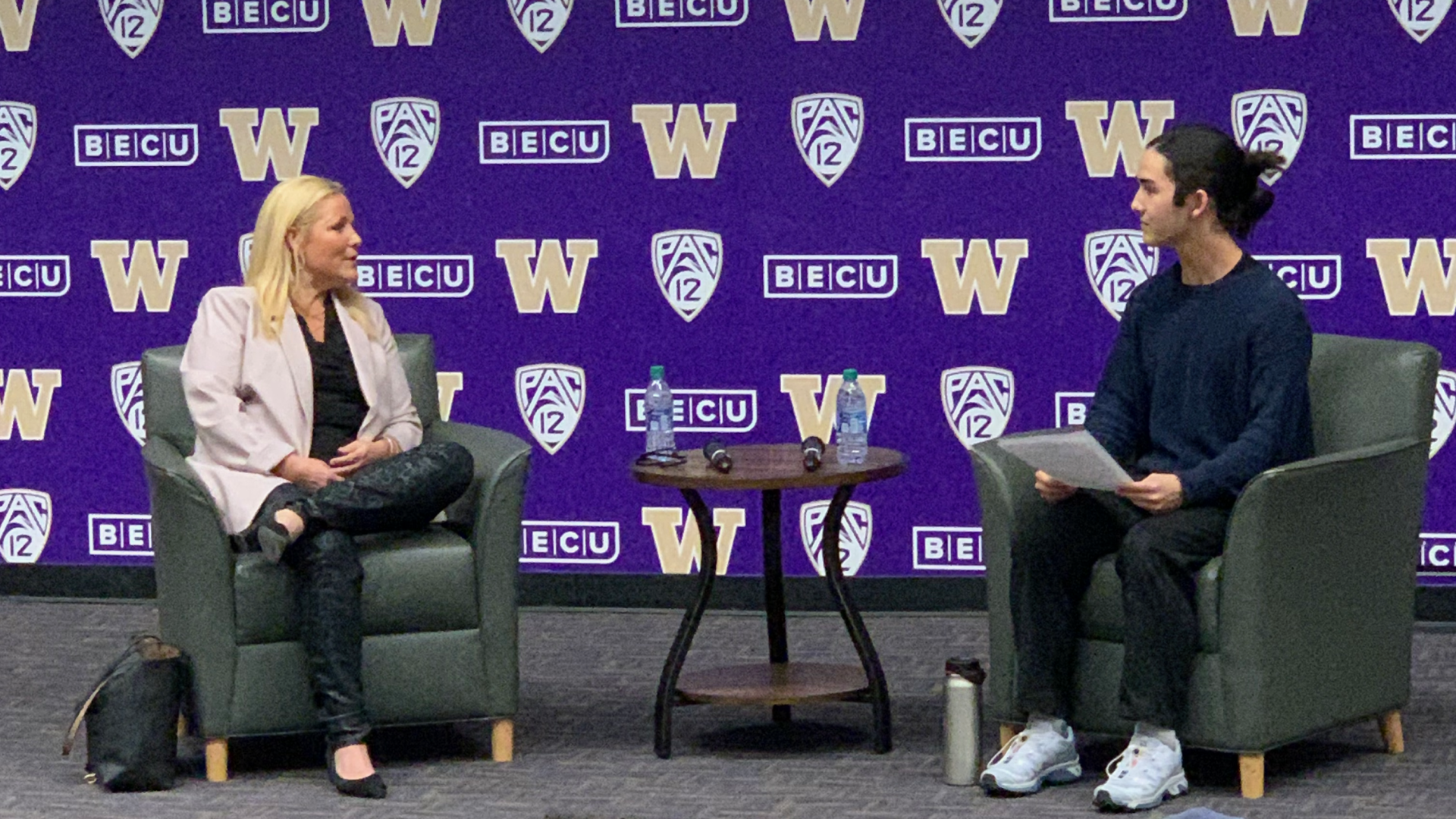UW Athletic Director Jen Cohen and I on stage at a FLA event