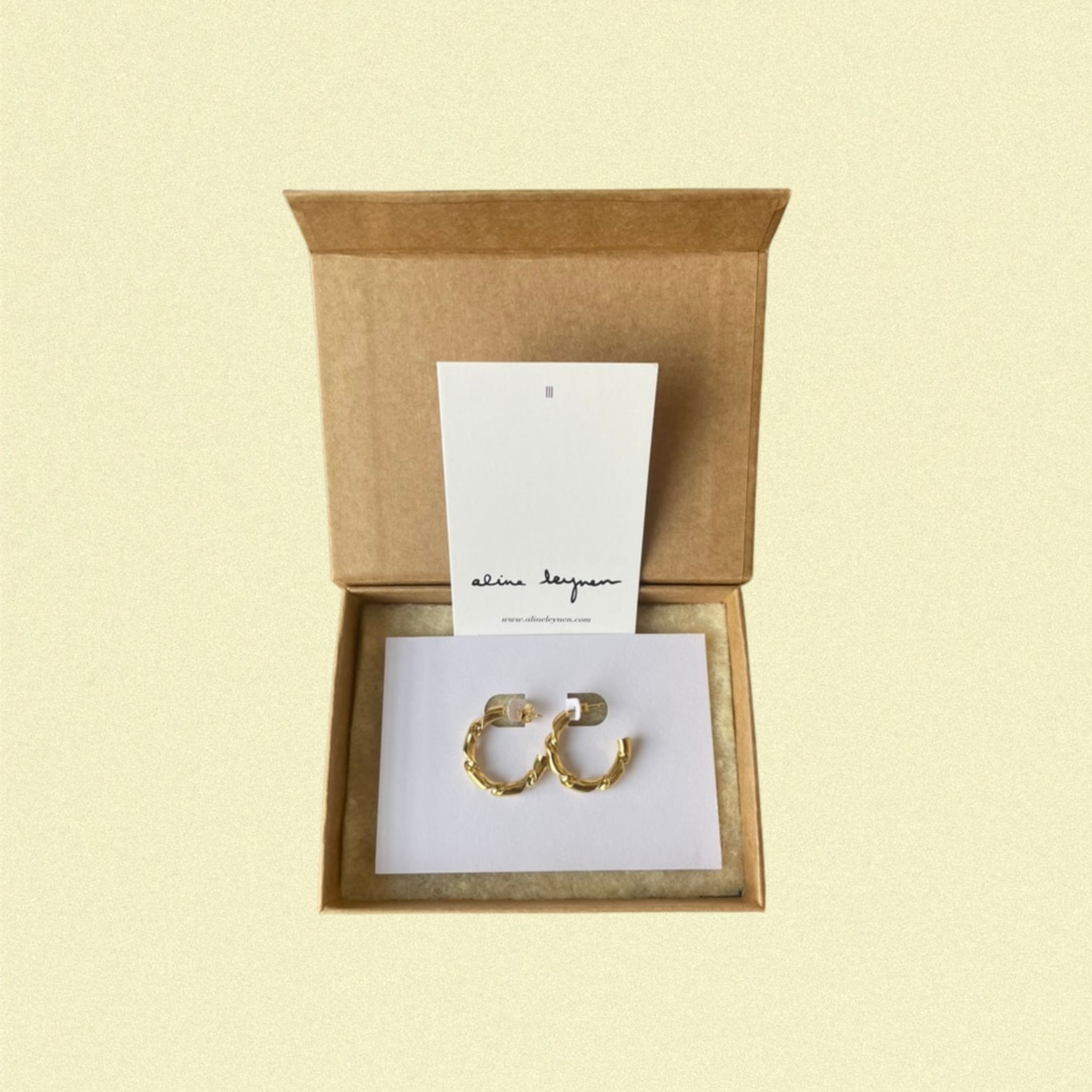 A finished order of chuncky twisted hoops. Made in gold plated sterling silver.