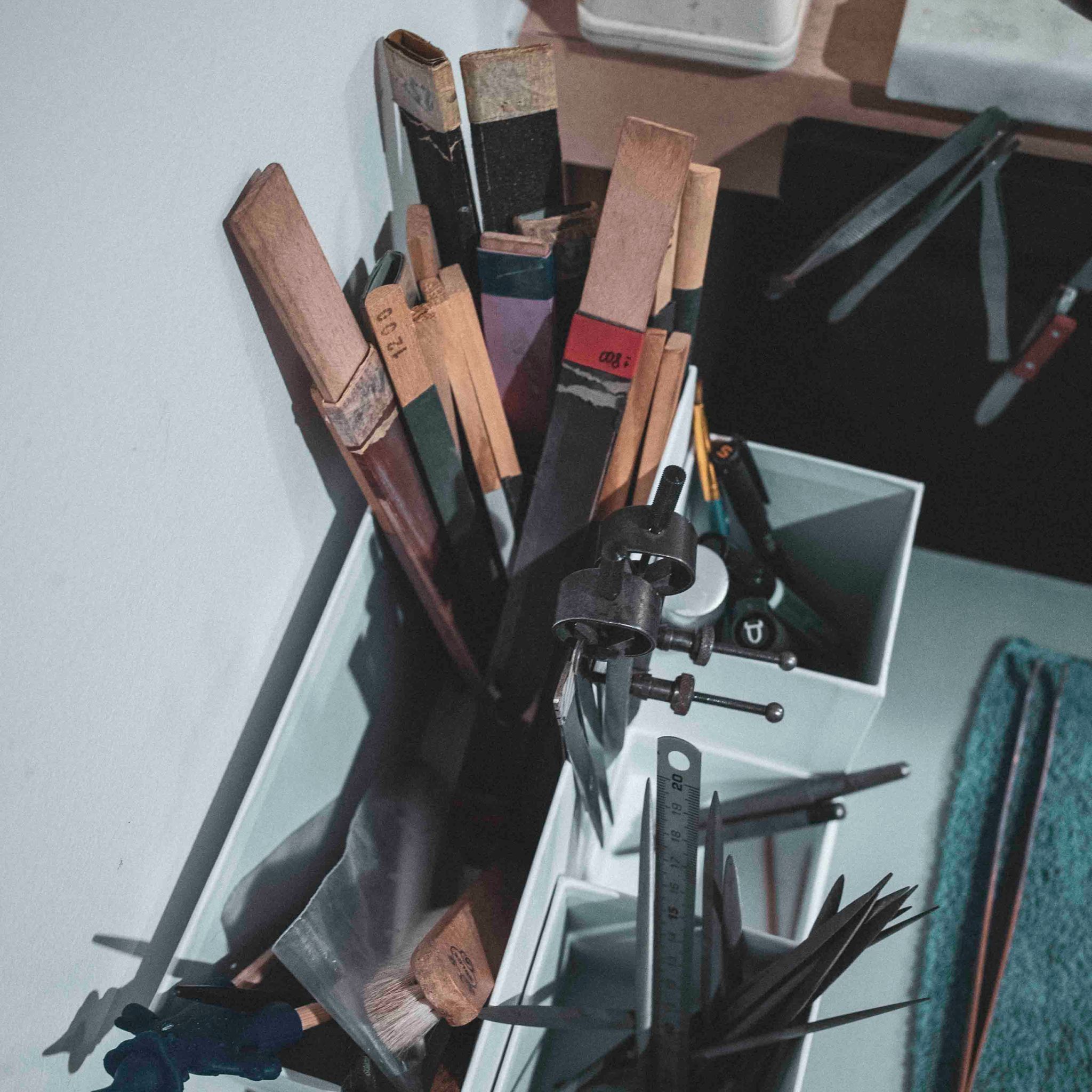 Close-up of filing and sanding tools.