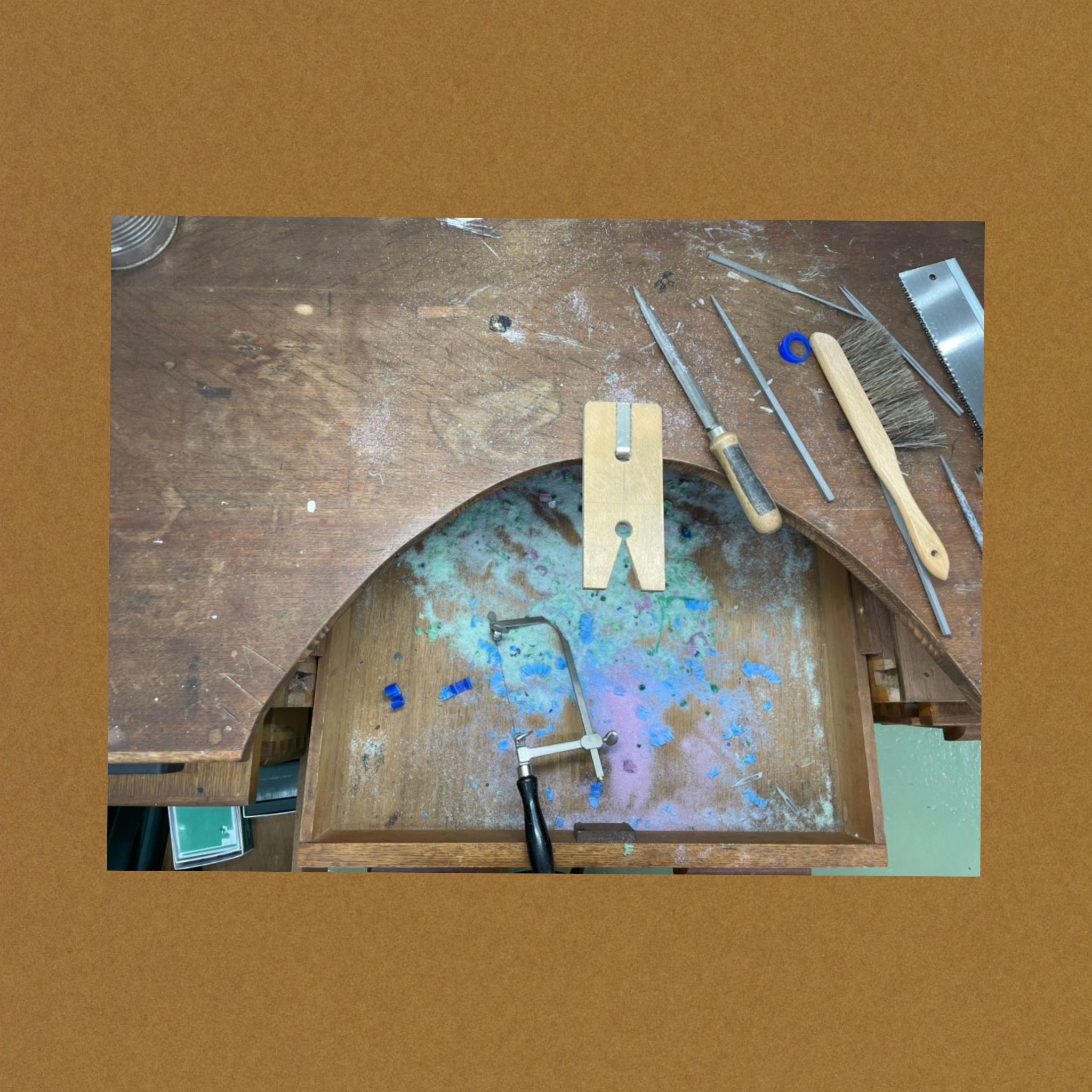 Workbench with wax shavings.