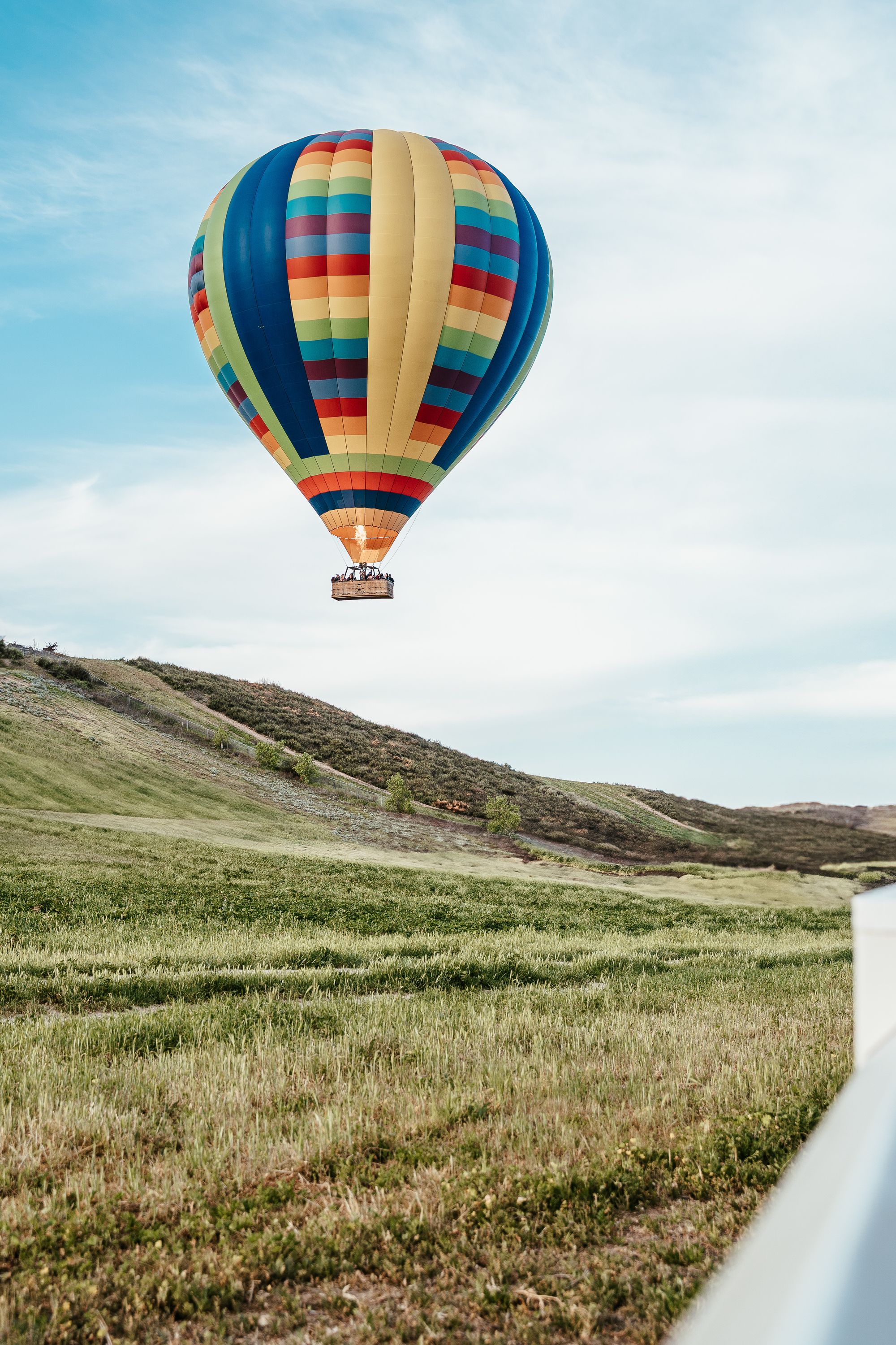Hot air balloon floating overhead in Temecula