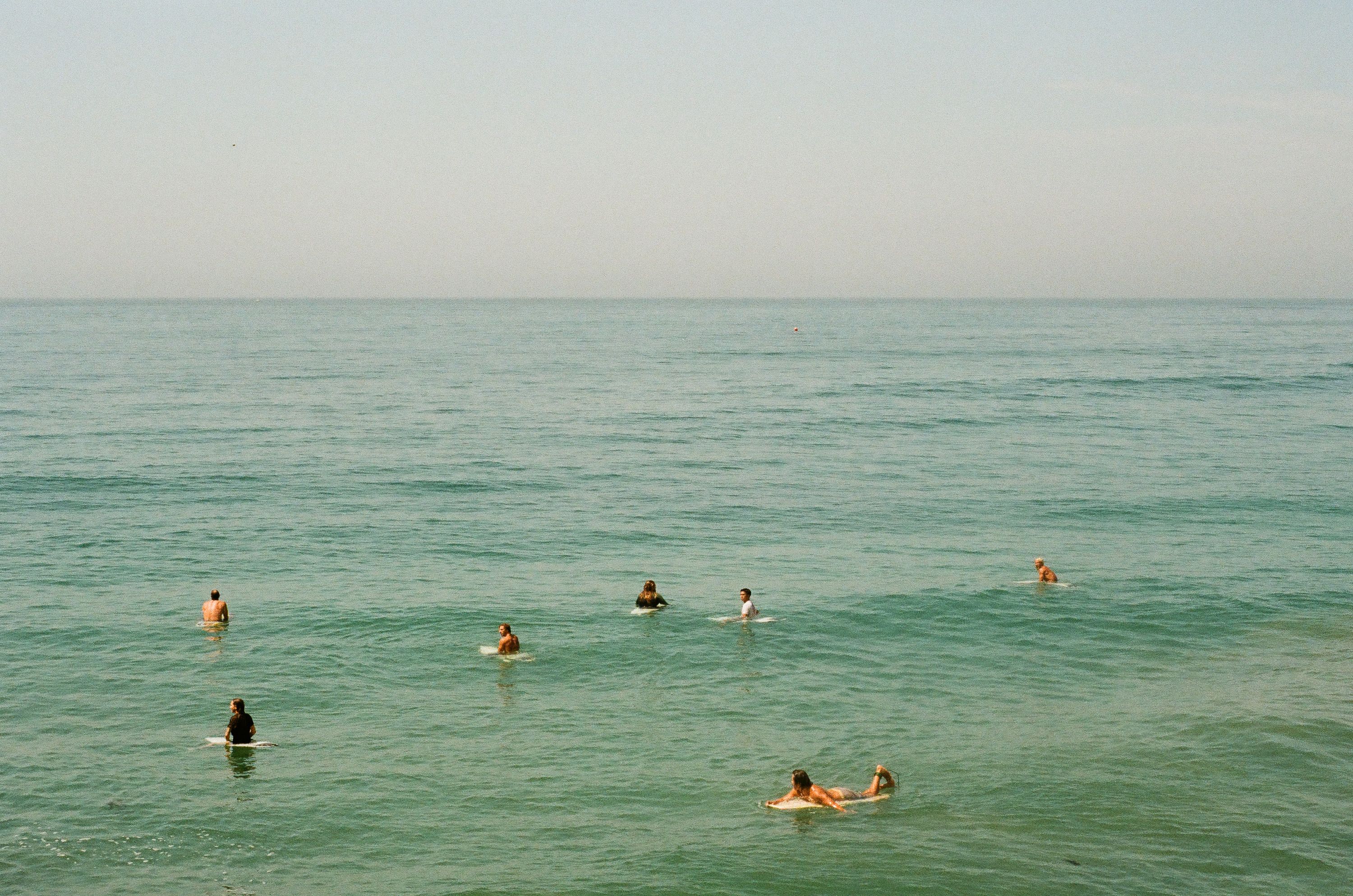 Surfers at the pier in San Clemente