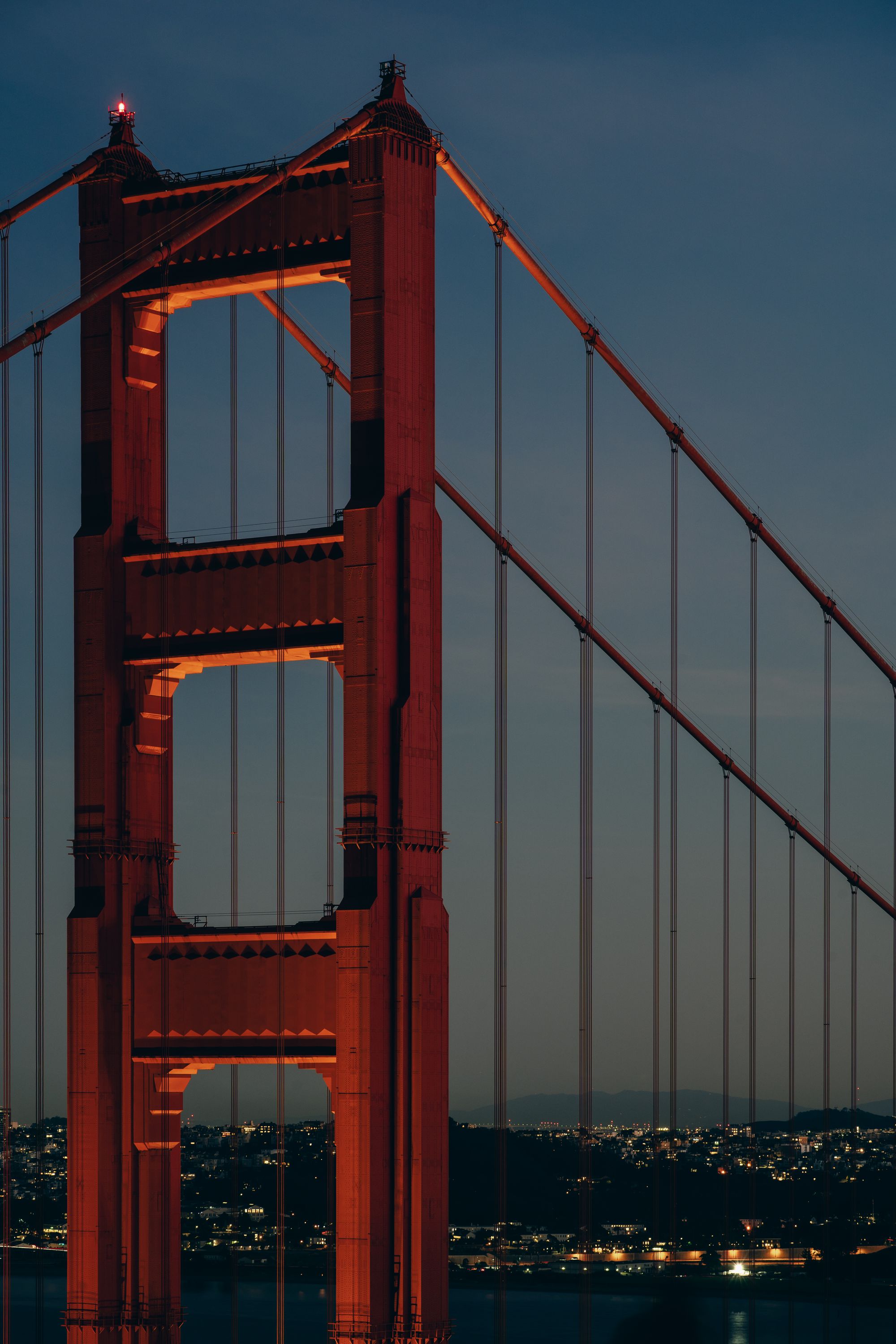 One of the towers of the Golden Gate Bridge at night