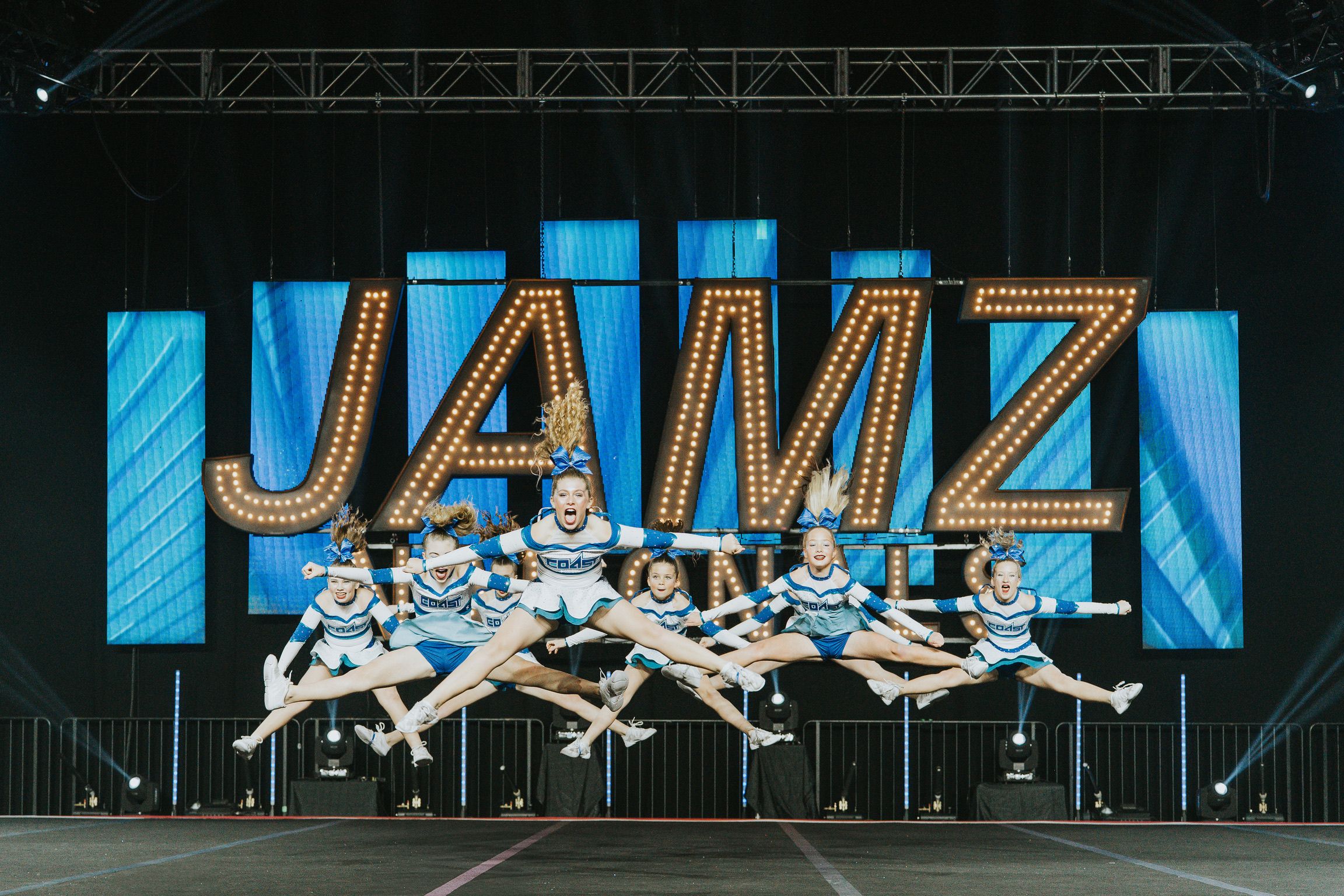 Riley's cheer team in flight at JAMZ Nationals in Las Vegas