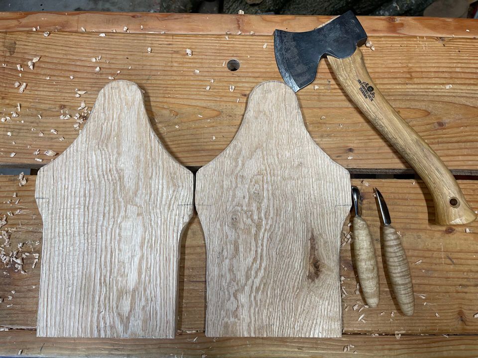 Red Oak parts for a project carved entirely with axe and knife.