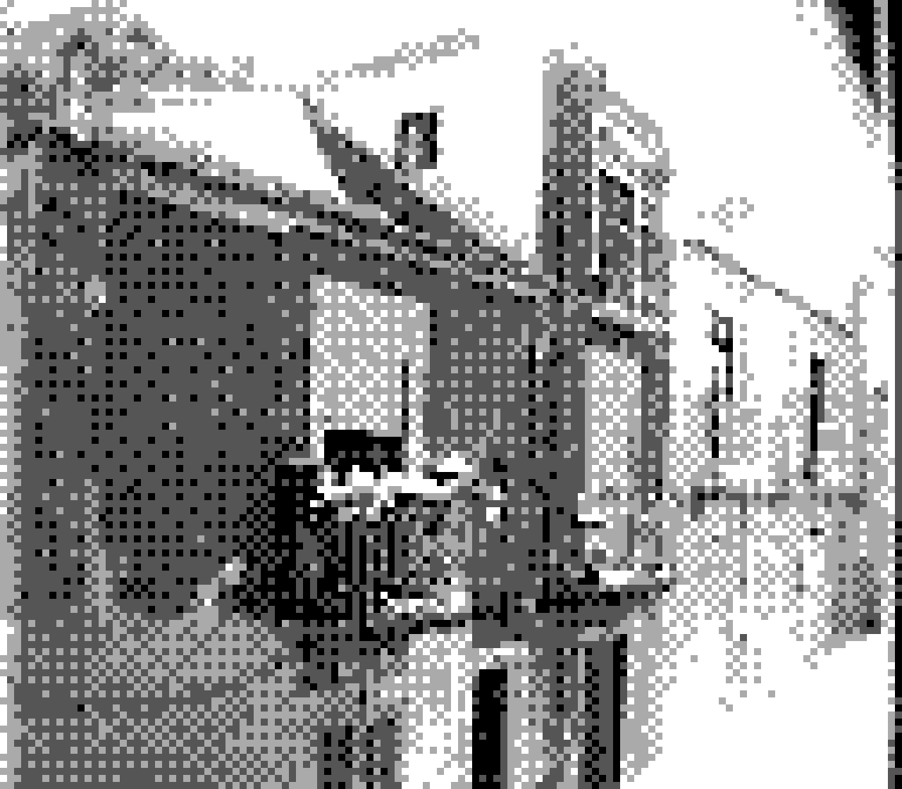Heavily pixelated image of debilitated house facades