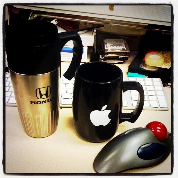 Honda mug, Apple cup, and mouse ball.