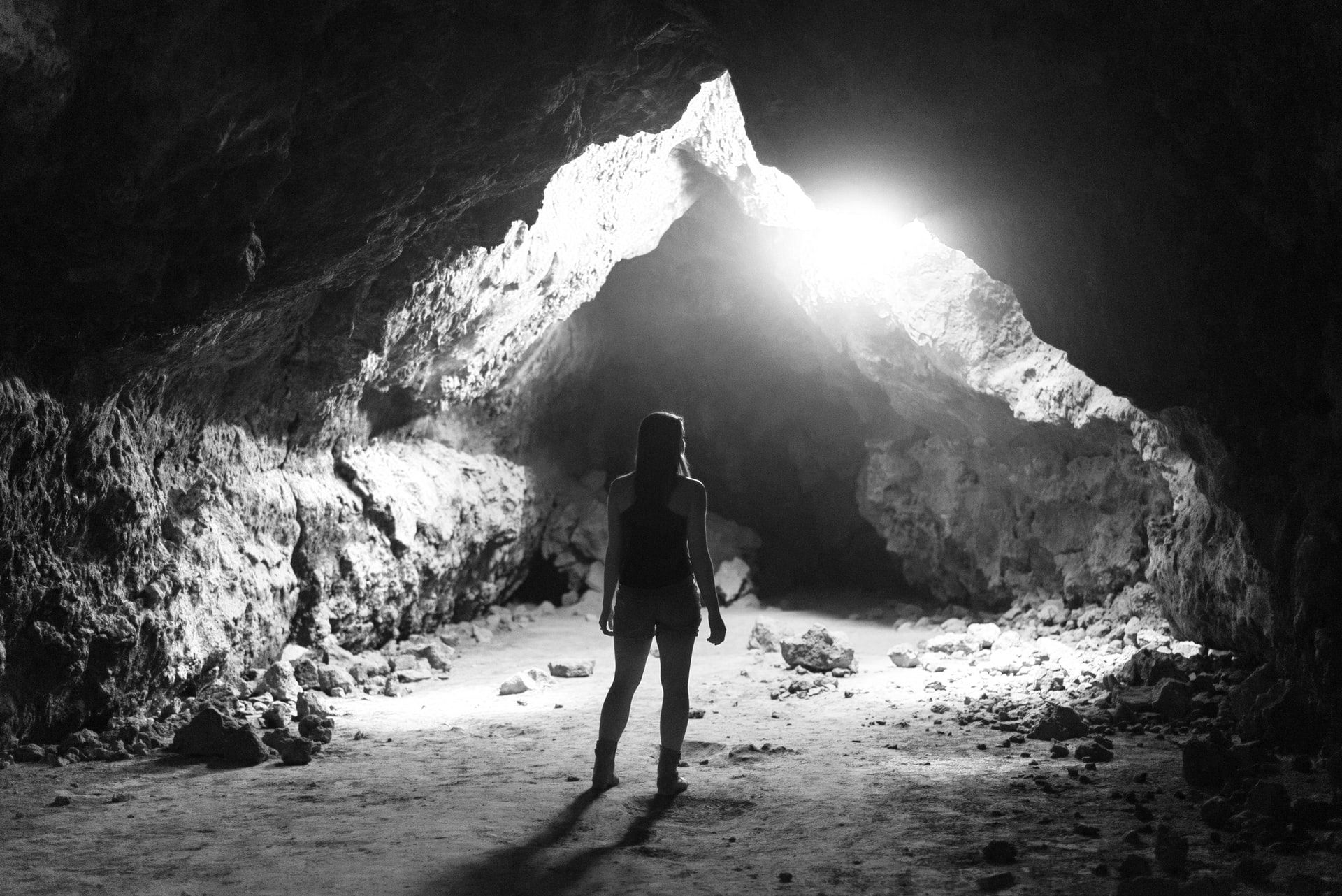 A woman exploring desert caves