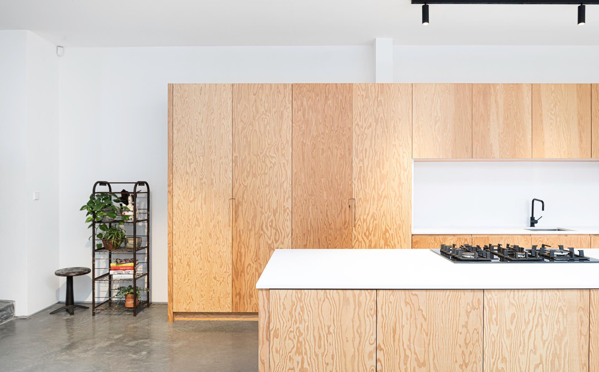 Douglas-Fir-Plywood-Kitchen-with-white-walls-and-polished-concrete-floor