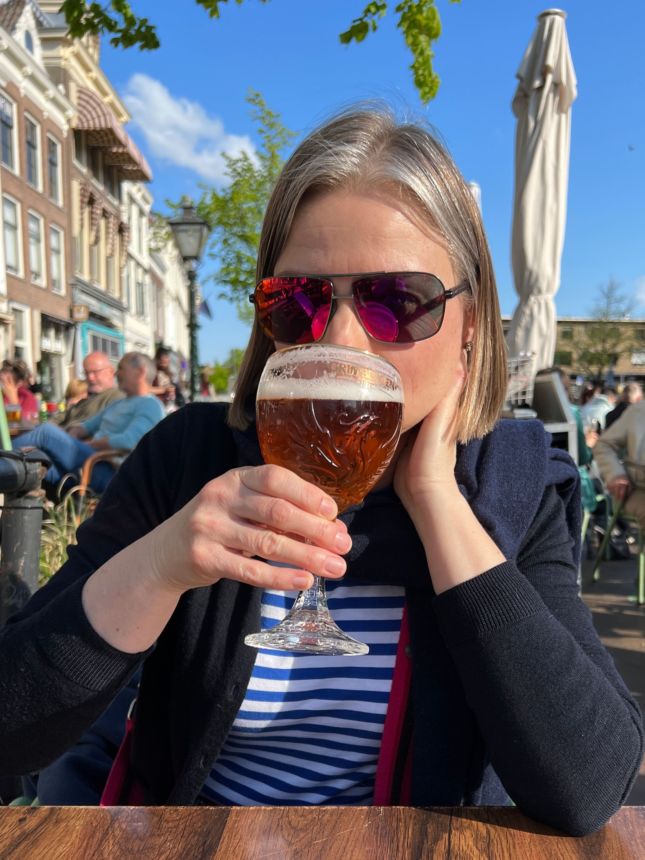 Kate enjoying a beer in the sunshine