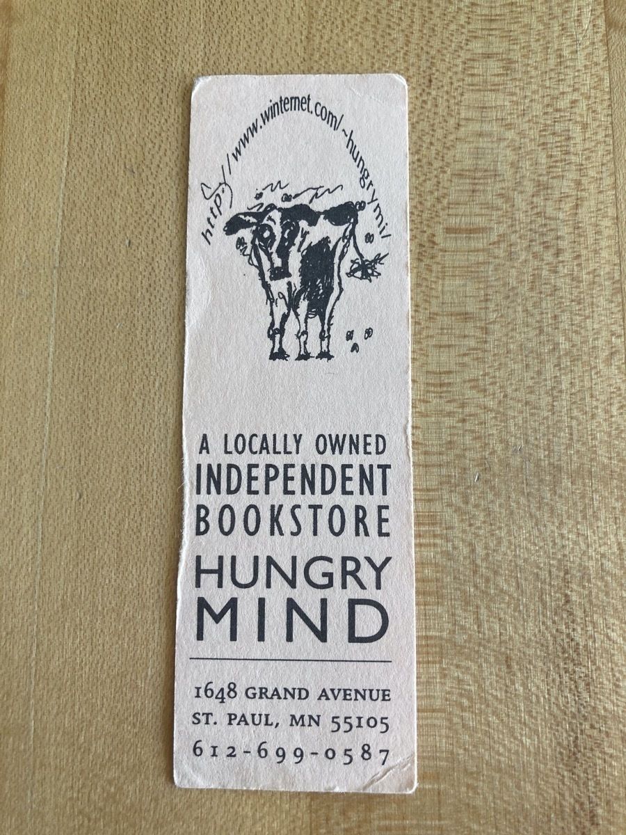 Hungry Mind bookmark with a drawing of a cow