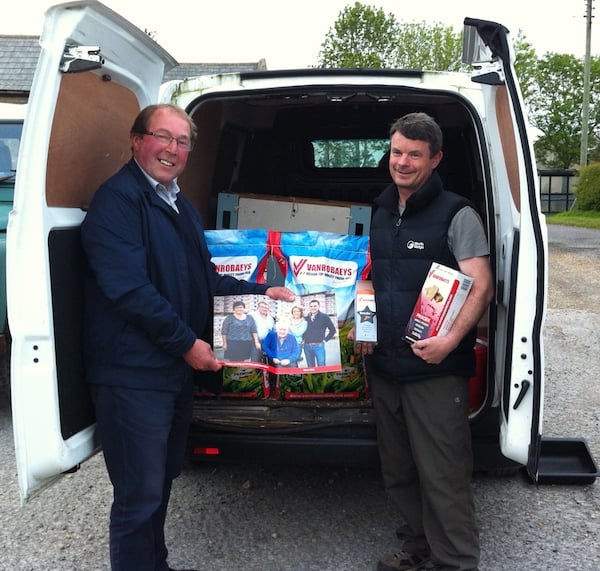 Tommy Johnson presenting Robert Dawson with the Vanrobaeys sponsorship for the Fougeres race