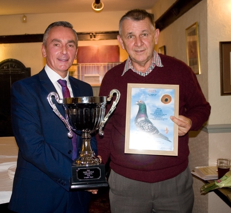 Bob McKie of Blackhall Mill was R_U for the Sportsman FC averages - Bob receiving the Tom Riddle Memorial trophy from Barrie Winter for winning the Sigogne race