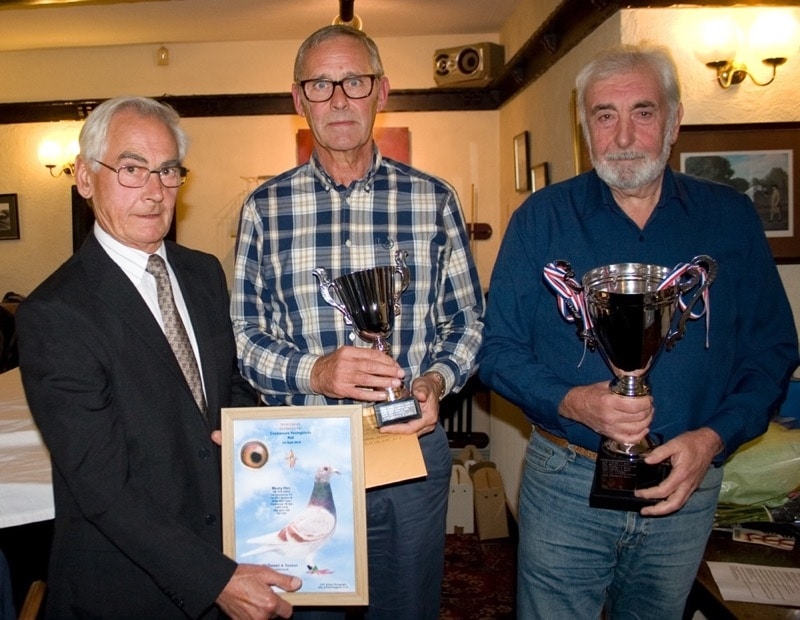 Peter Winter presenting Jim Sexton & Dave McSween with their trophies - McSween & Sexton of Sunderland were highest prizewinners in the Sportsman FC & won Coutances Youngbird race & the Sportsman FC Averages trophy 2018