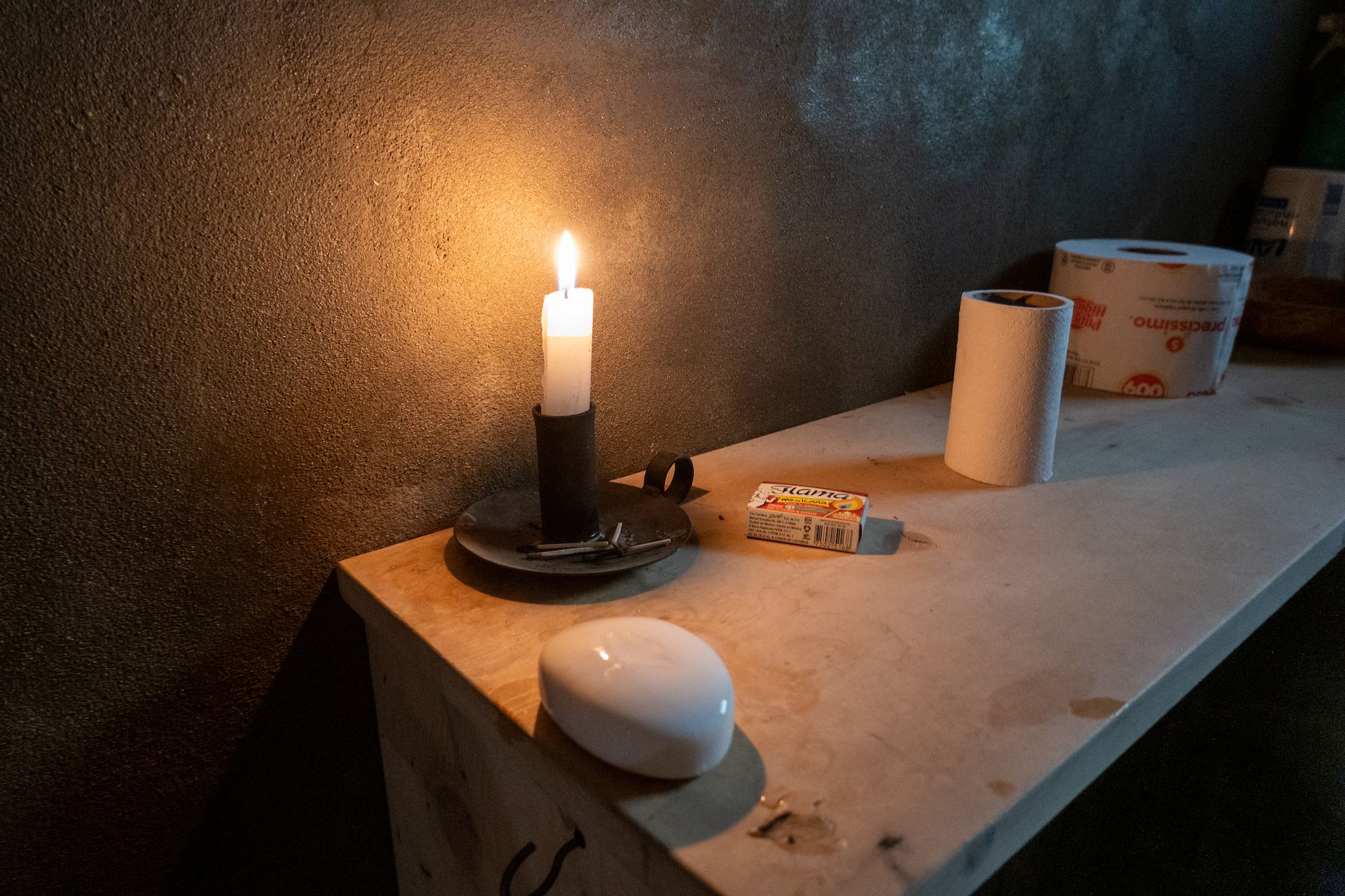 The ranch is run on solar panels. In the bathroom, candle lights add to the ambience.