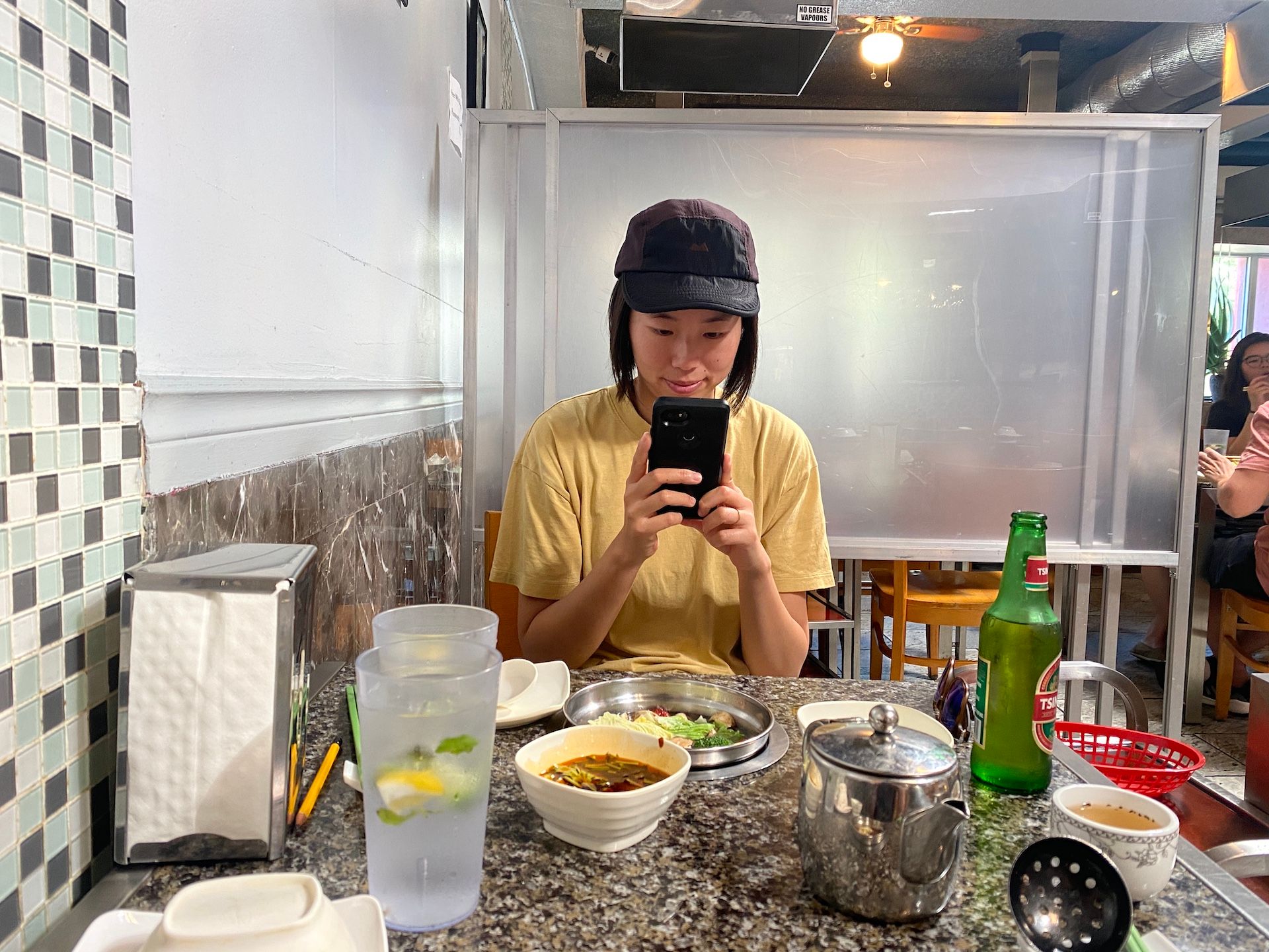 You can usually gauge if a Chinese restaurant is good and authentic based on whether Kuan takes pictures of her food to send it to her family.