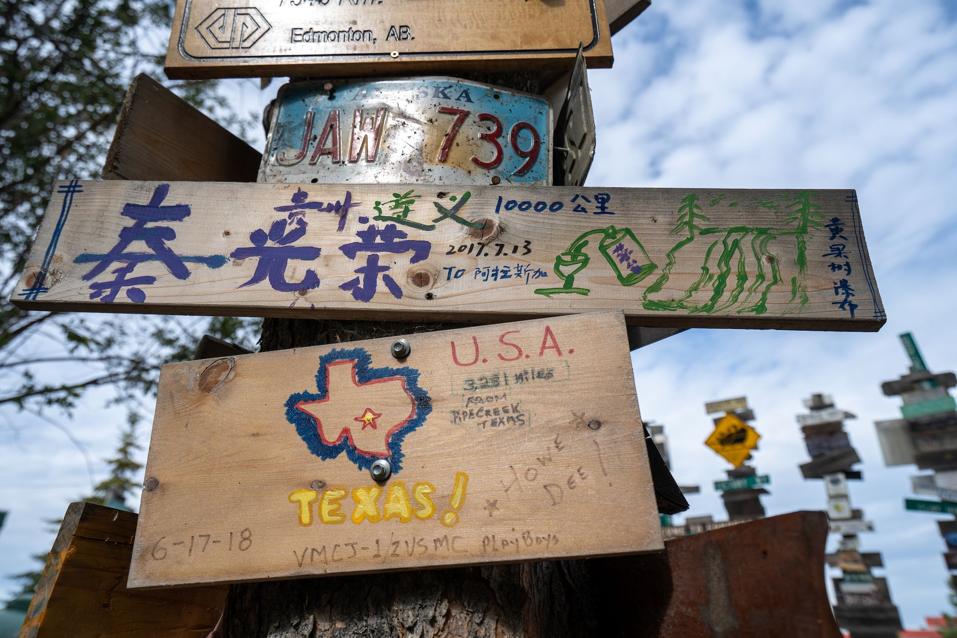 People from all over the world leave signs in Watson Lake, including this family from Guizhou, China!