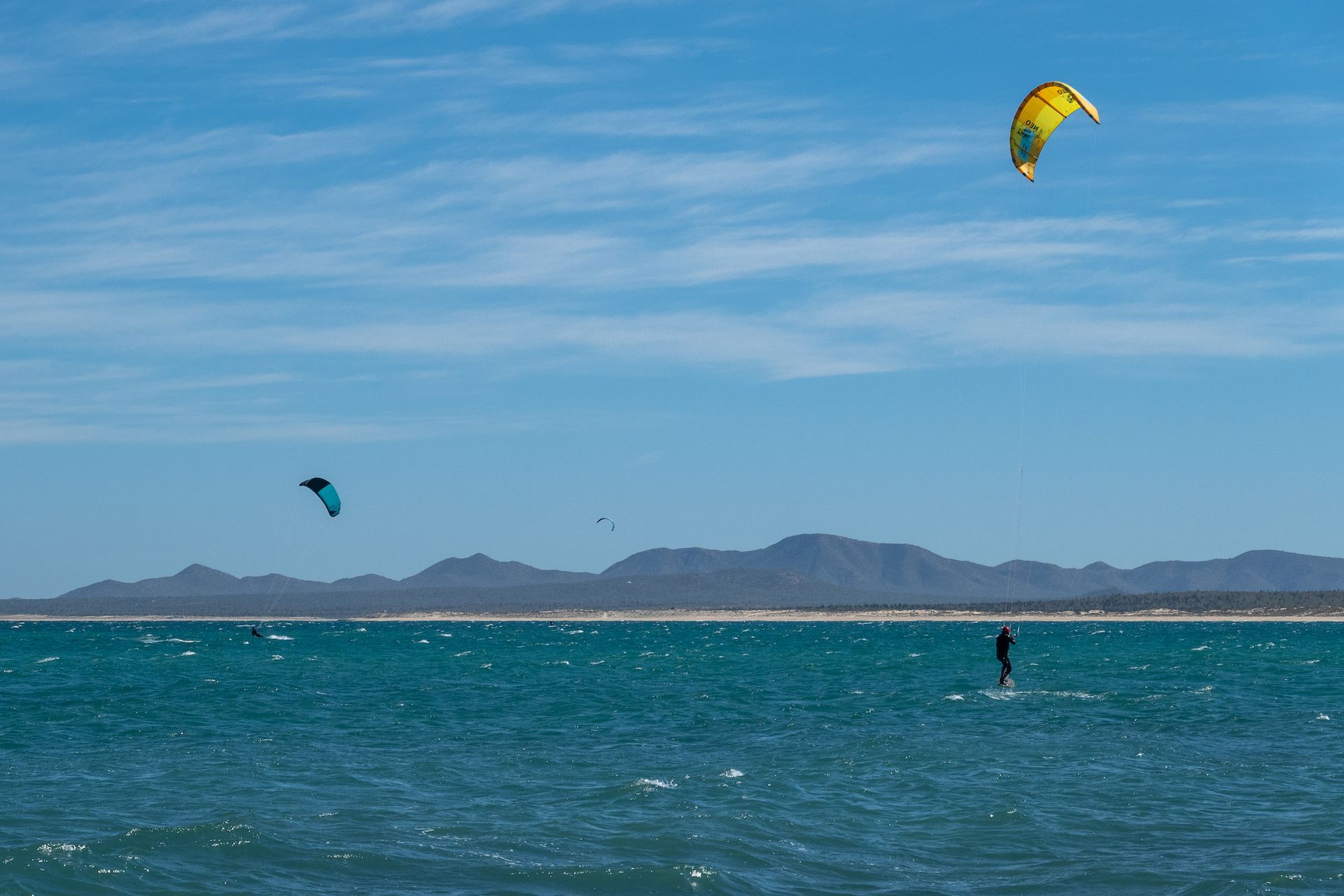 Kite surfers as far as the eyes can see