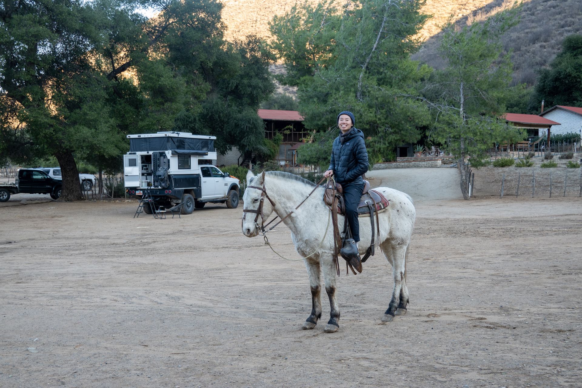 Happy Kuan on the horseback