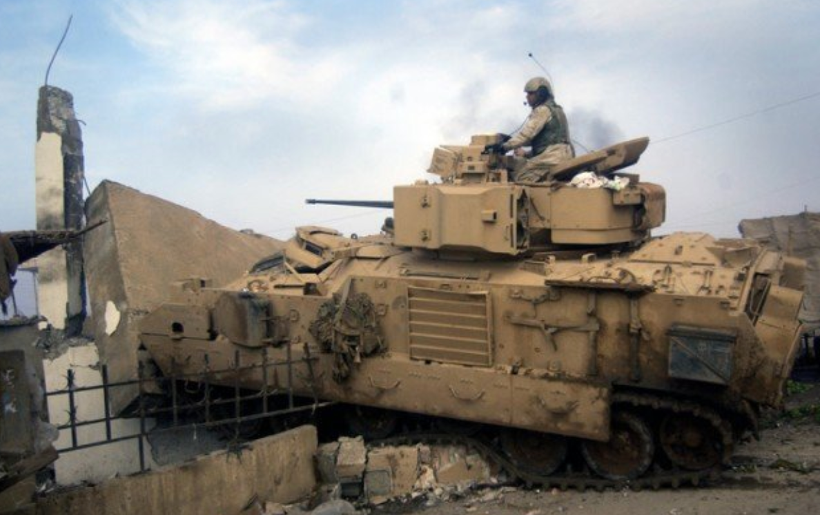 An American Bradley fighting vehicle during the 2003 thunder run into Baghdad. (Miltours Blog)