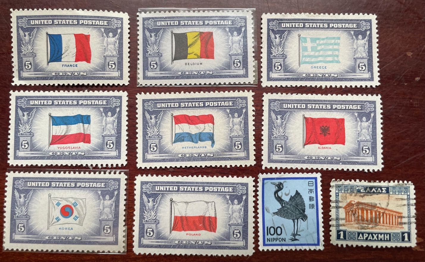 These flags are part of a collection of the liberated countries of World War II. I have an entire page showing the complete collection, but I'll just throw these on here as a nice representative sample, along with stamps from Japan and Greece to add to the international flavor. 