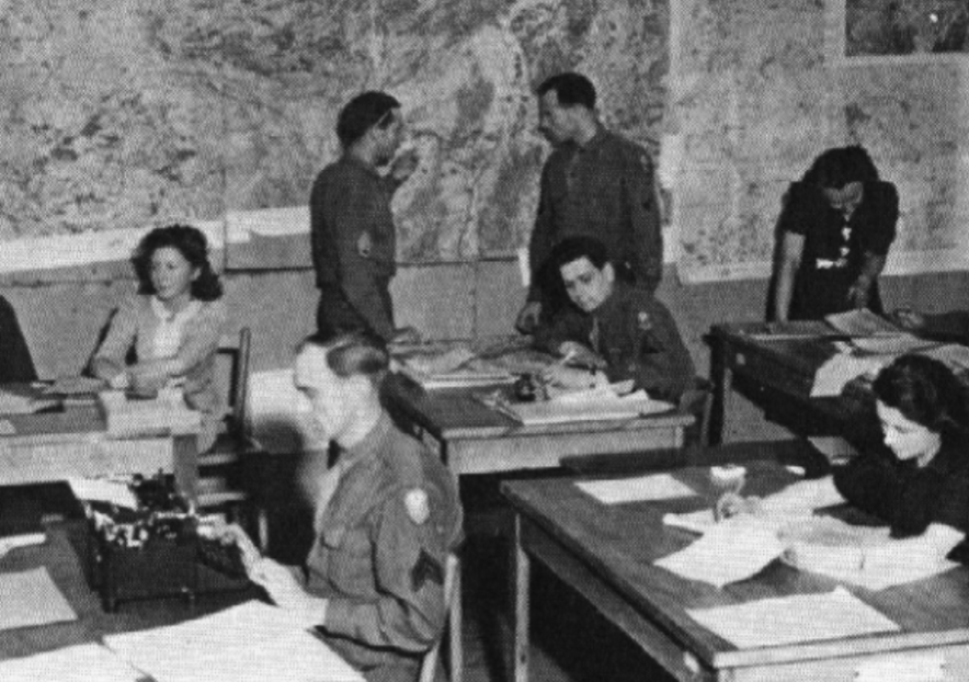 Enlisted and civilian personnel of the Historical Section at work. (Photo Courtesy of F.D.G. Williams, SLAM: The influence of S.L.A. Marshall on the United States Army)