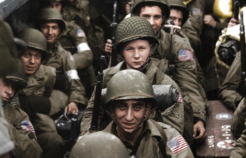 American servicemen pose for the camera aboard an Oran-bound LST during Operation Torch. Image courtesy of Cassowary Colorizations.