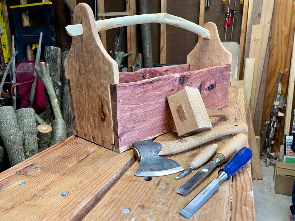 This large tool tote was made entirely by axe, knife, chisel, and gouge.