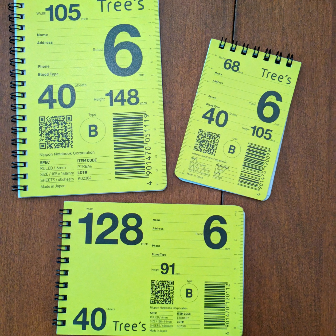 These are notebooks I'd never seen before. They're Japanese with nice paper and the pages have check boxes at the start of each line. 3 different sizes and naturally I bought them all. Also, the color representation on this picture is poor. The covers are yellow, not the green-ish whatever that's shown. Apologies. 