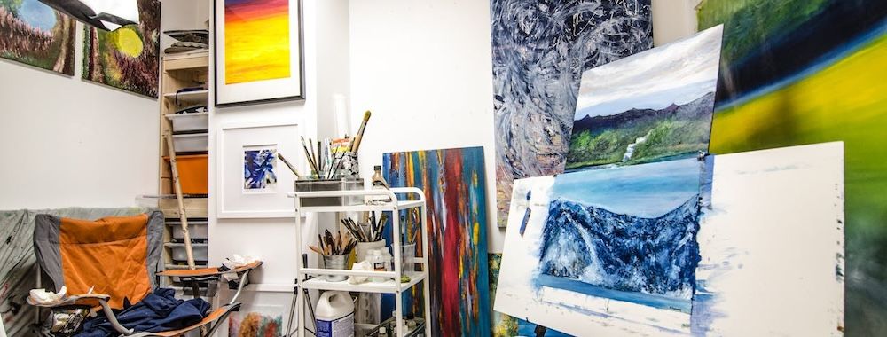 Artist studio with canvases and paints