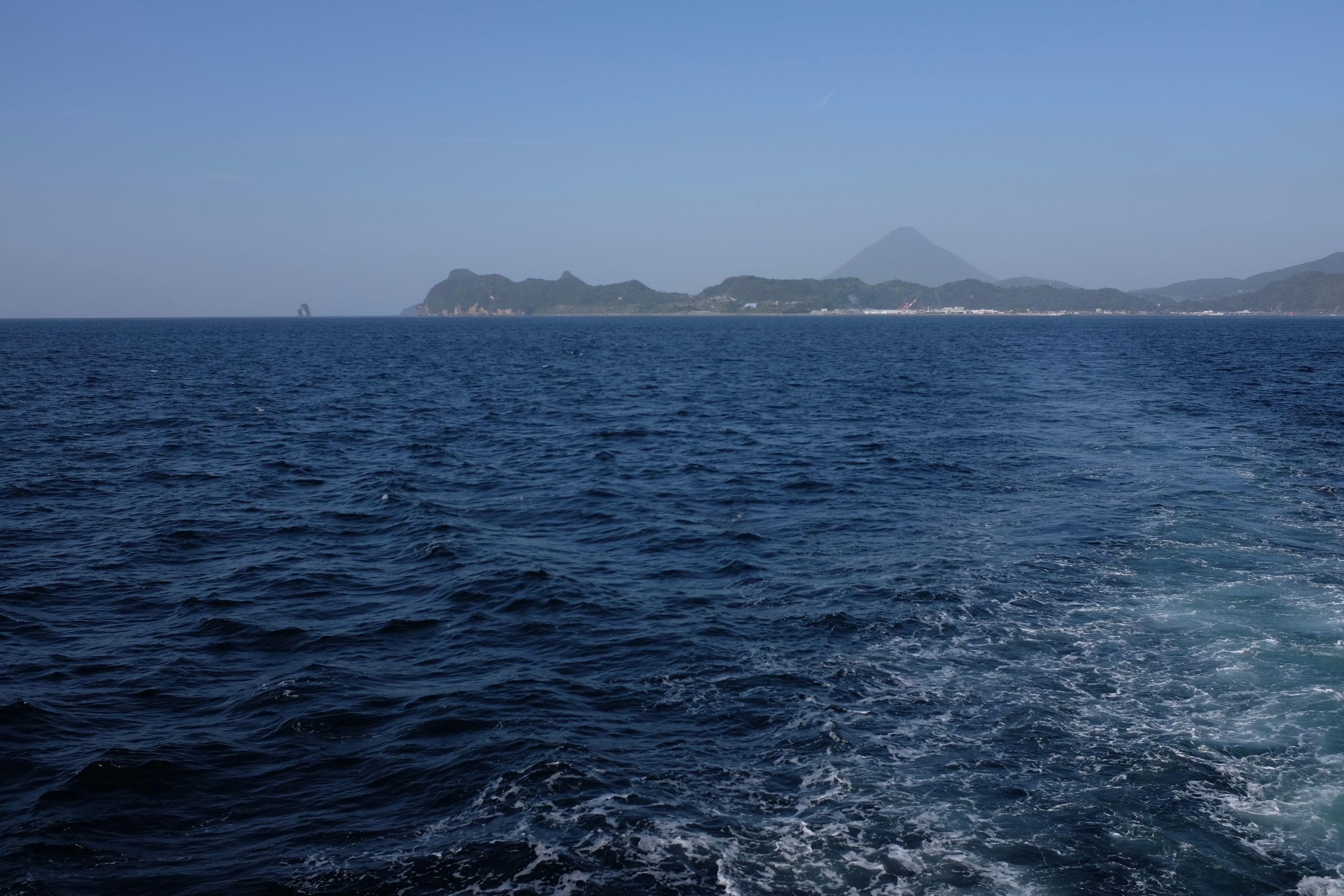 Mount Kaimon rises in the distance as seen from the ferry.