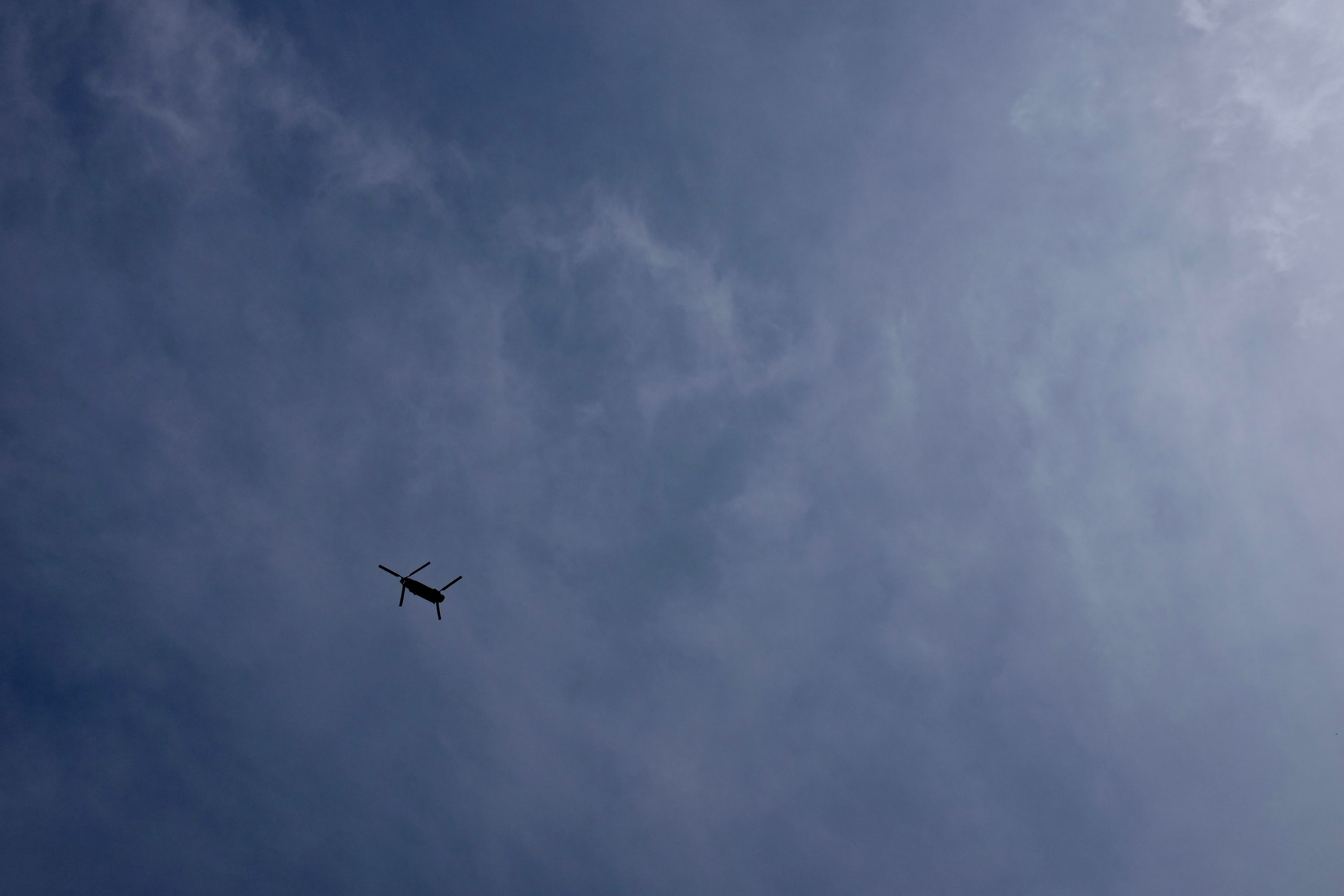 A Chinook military helicopter in the sky.