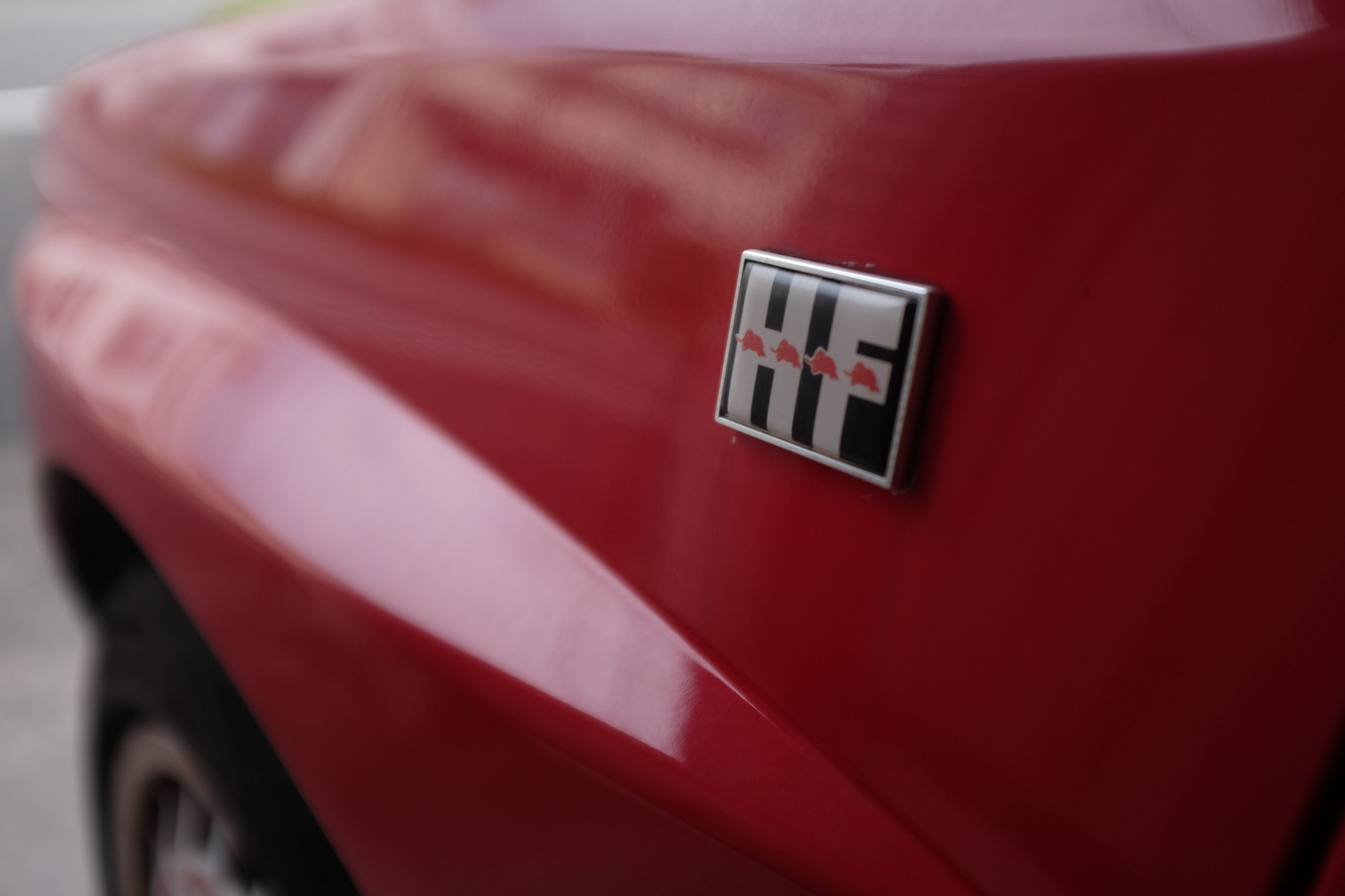 Closeup of the emblem of the Lancia showing four elephants.