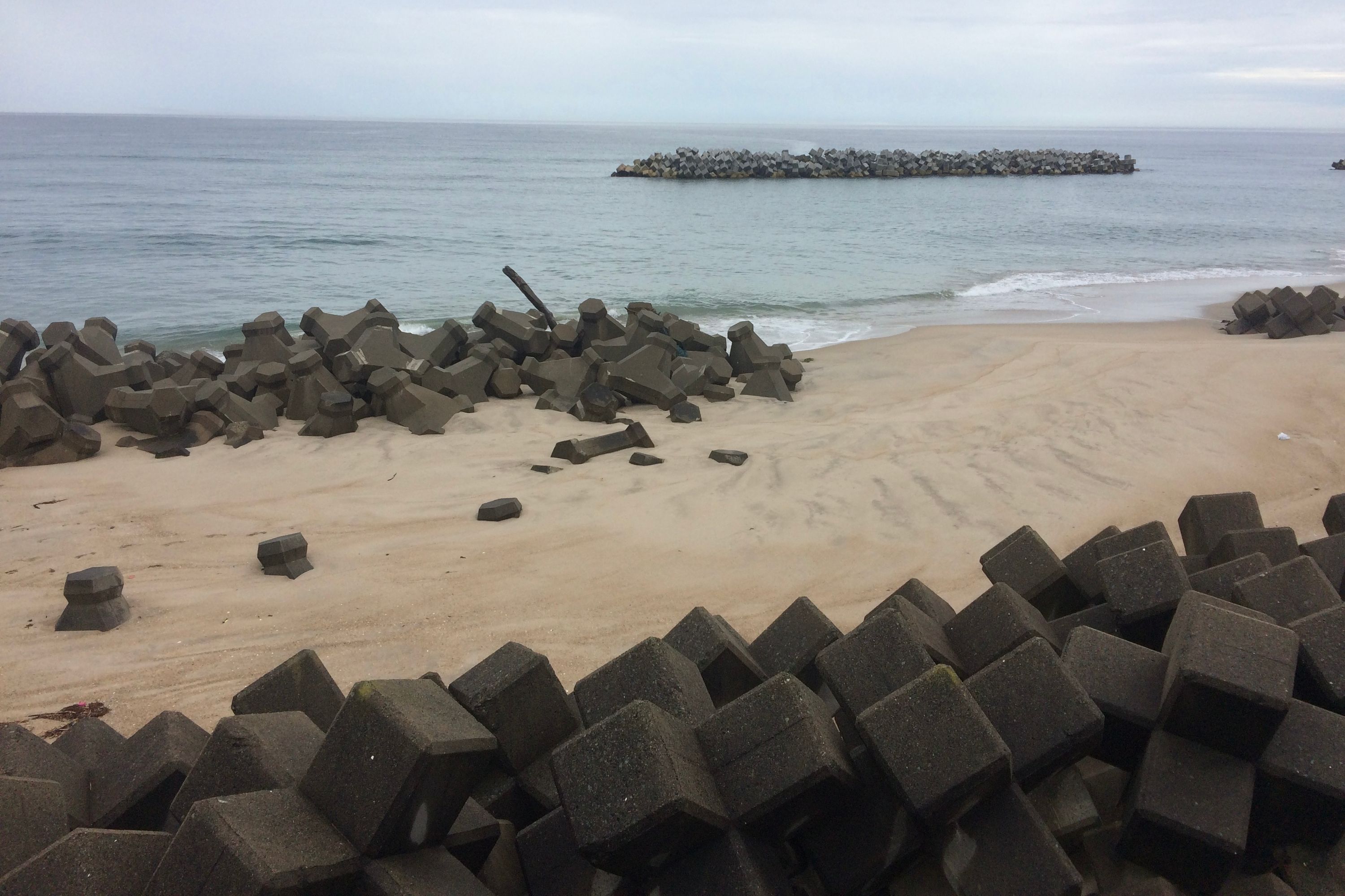 Concrete tetrapods on the beach.