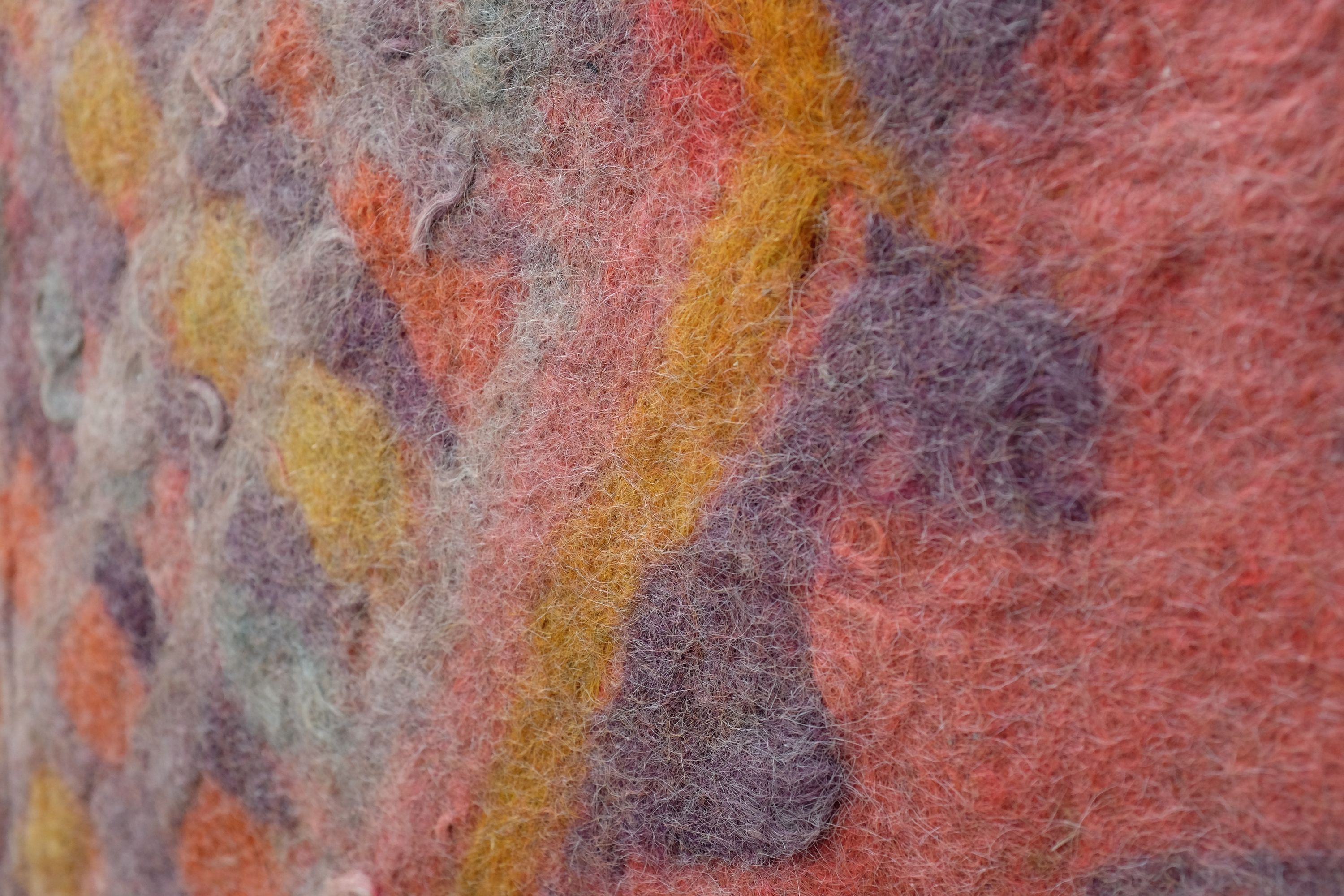 Closeup of a very colorful carpet.