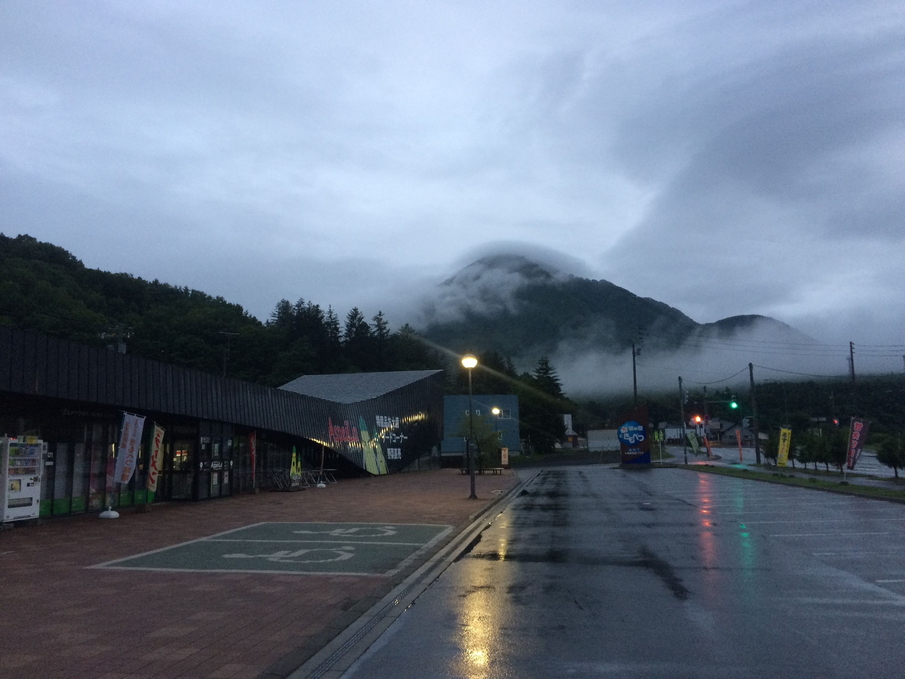 A roadside stop in the evening light on a dark, rainy day.