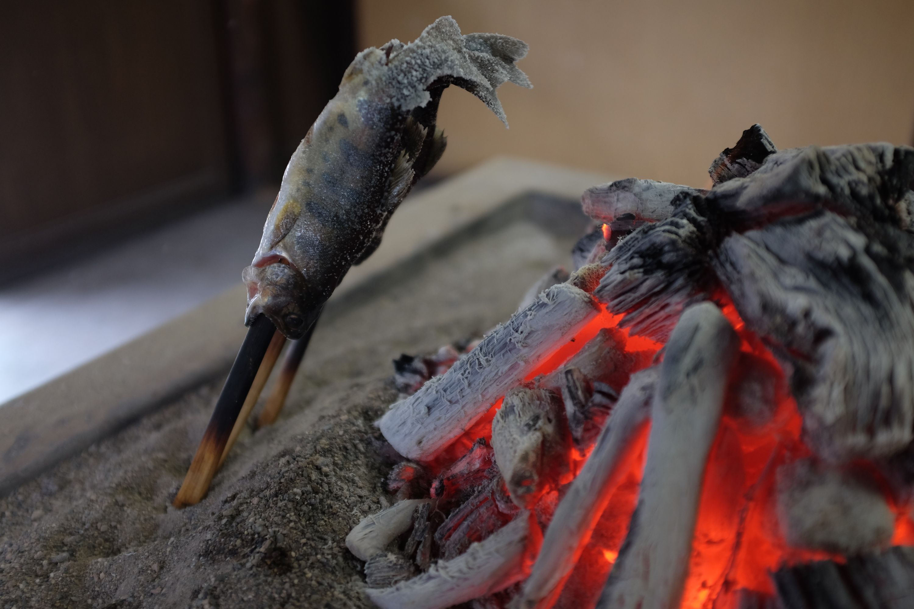 Trouts grilled on hot coals.