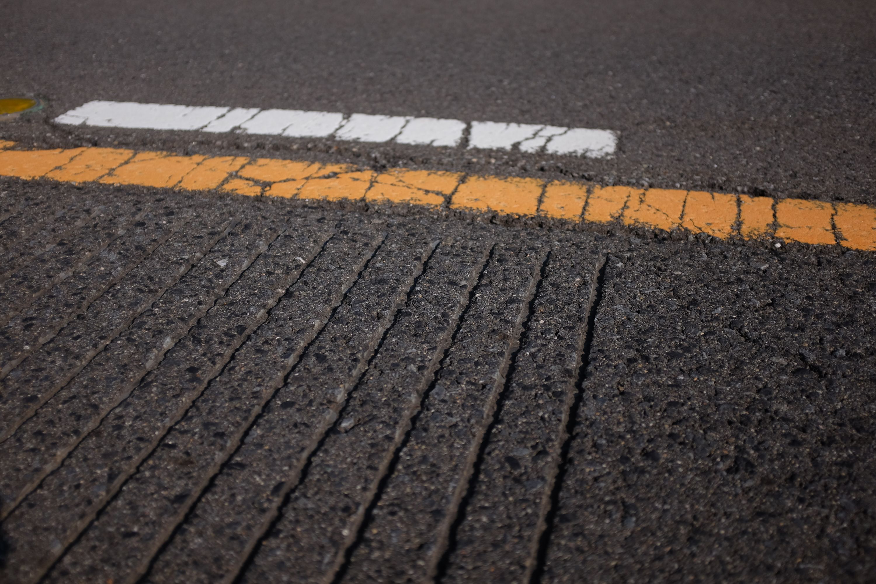 Grooves in the surface of the road which make a tune when driven over.