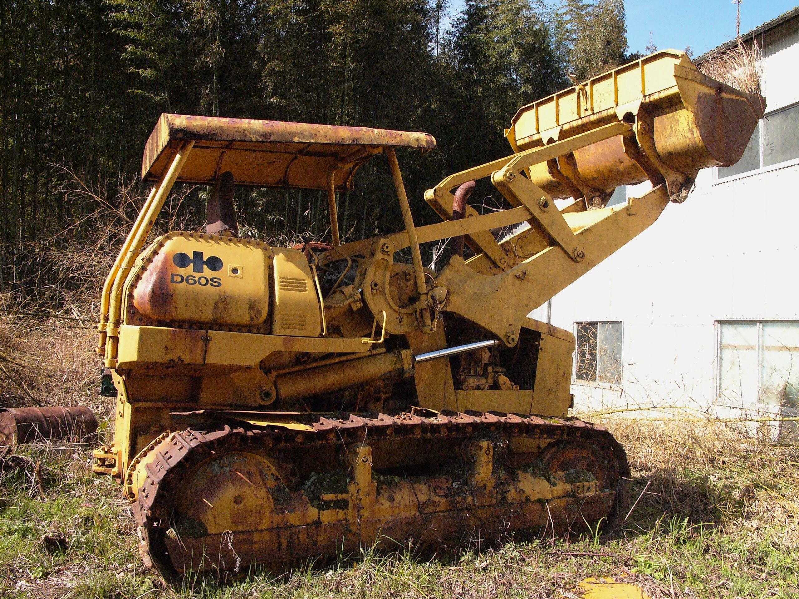 A small yellow excavator.