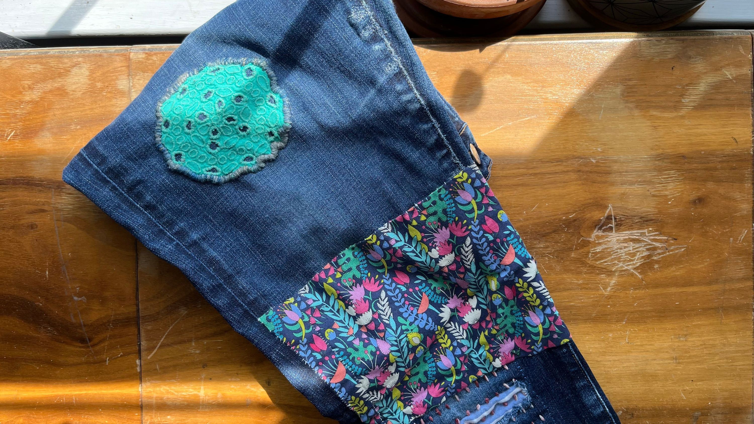 One leg on my Work Jeans, mended with some fun fabrics I have in my stash.